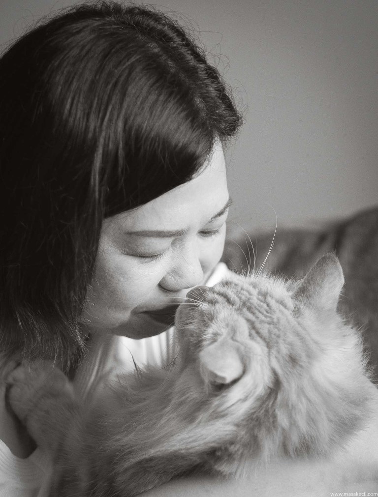 A loving owner and her cat.
